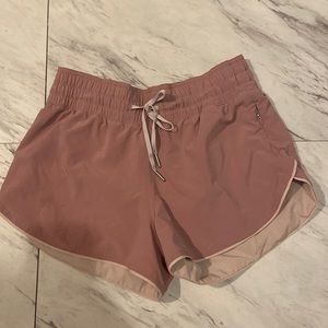 LULULEMON reversible track that high rise shorts